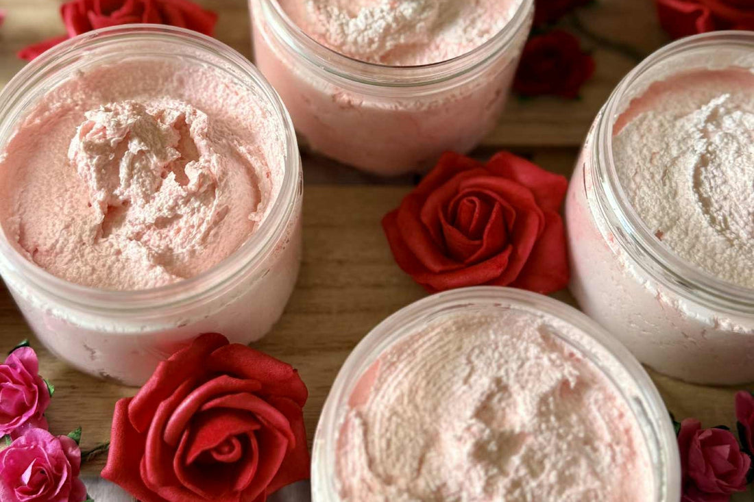 Jars of pink cream with red roses on a wooden surface