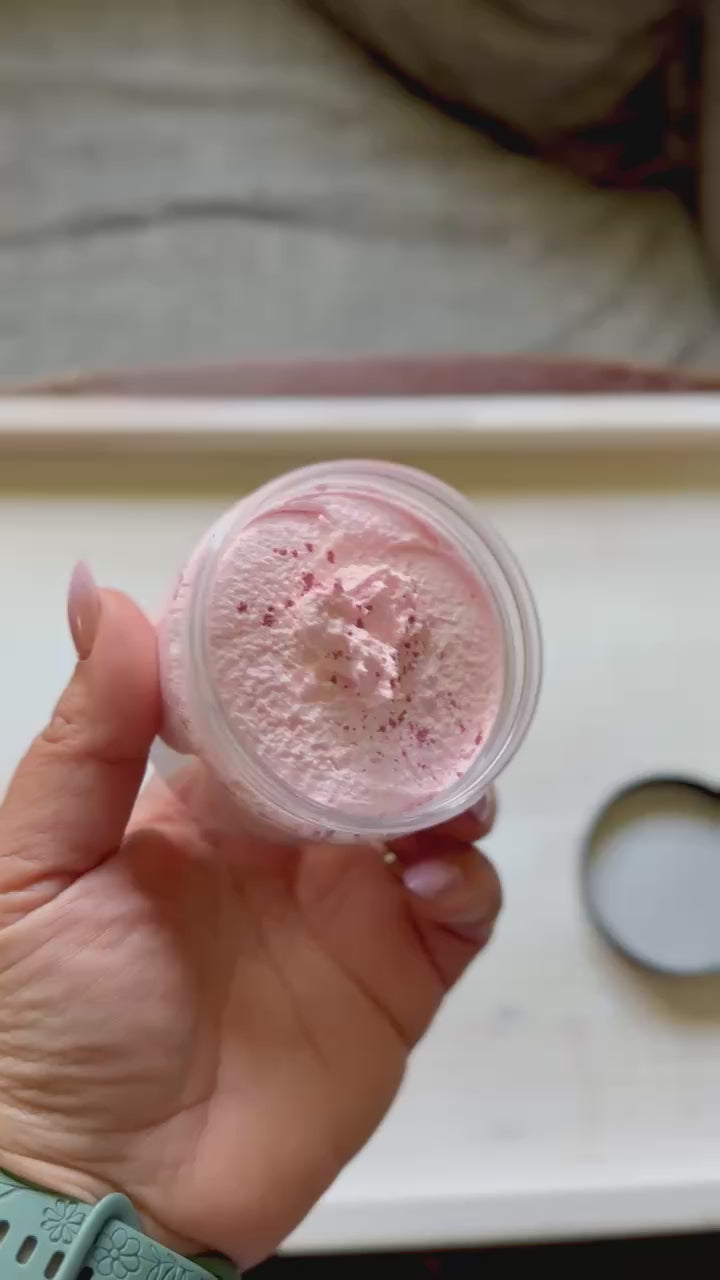 Load video: Video of hand holding creamy pink sugar scrub